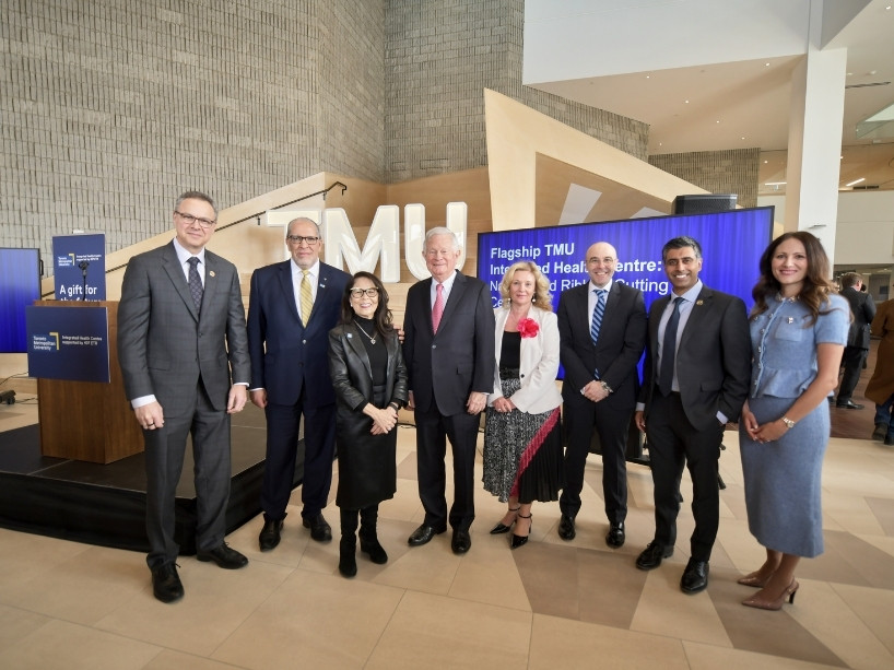 Group of TMU and 407 ETR leaders pose for a photo.