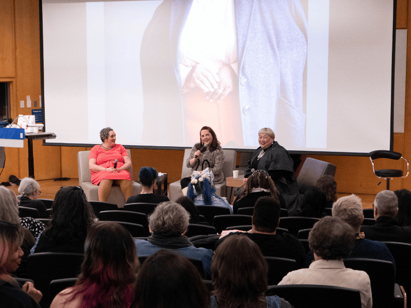 Three women during panel discussion.