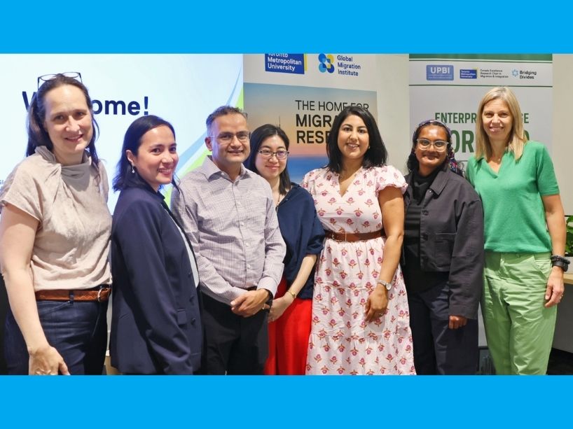 7 Attendees pose for photo