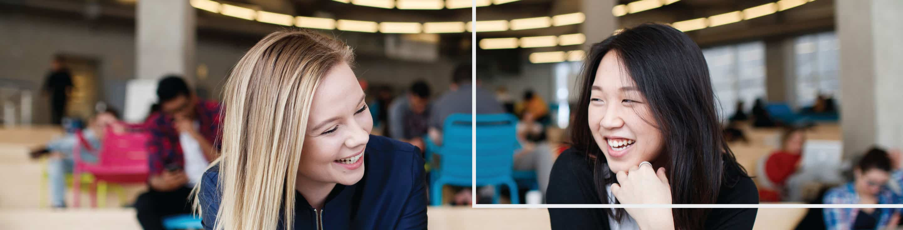 two students smiling on the beach floor of the Student Learning Centre, with transparent shapes overlaid on top