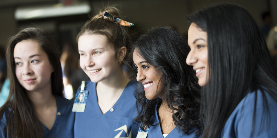 Students in a happy mood at the Toronto Metropolitan University Nursing Pinning Ceremony