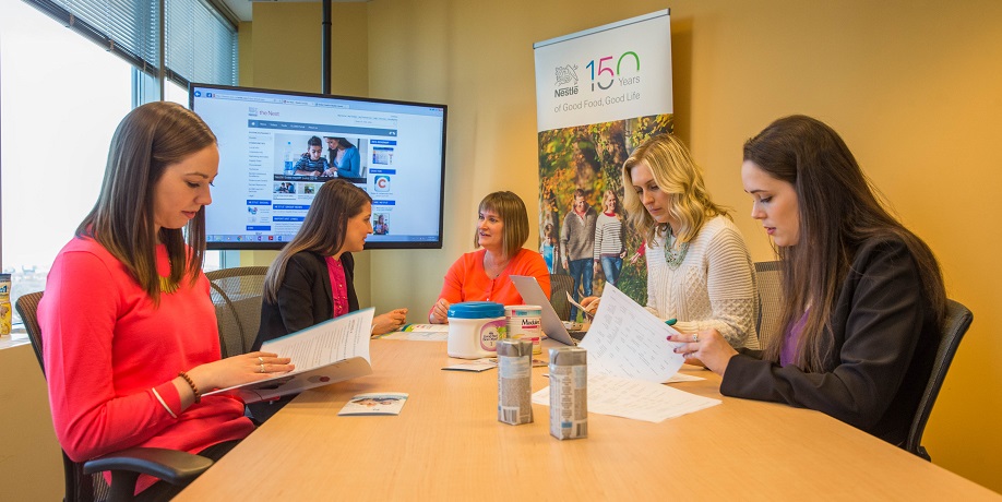 Nutrition students working in conference room