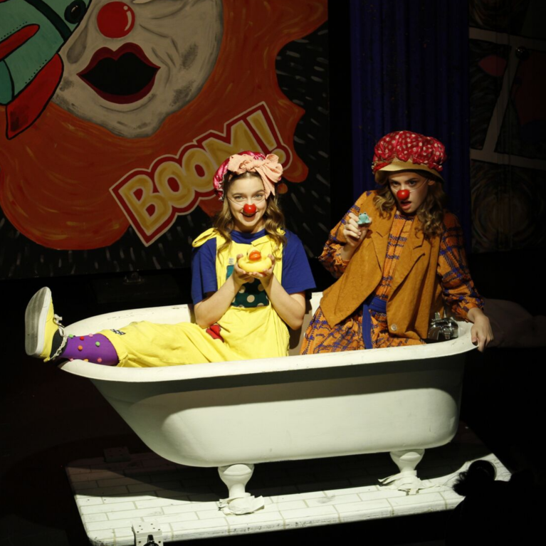 Photo of students performing on stage