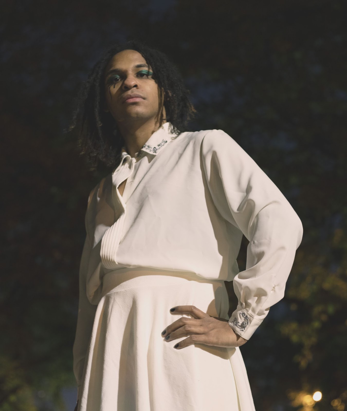 Chris Liz looks down at the camera