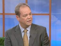 A still on Jon Wylie being interviewed