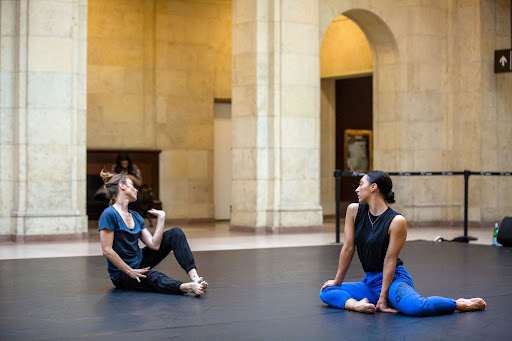 Two dancers on a dance floor in union station