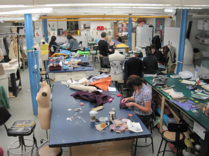 Students working in a colourful costume studio.