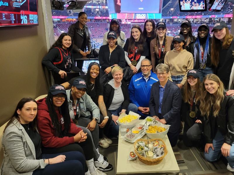 A group of students and staff with Mohamed Lachemi at the Scotiabank Arena.