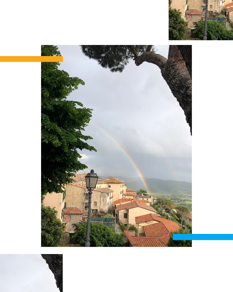 The sky showing a rainbow in an Italian city