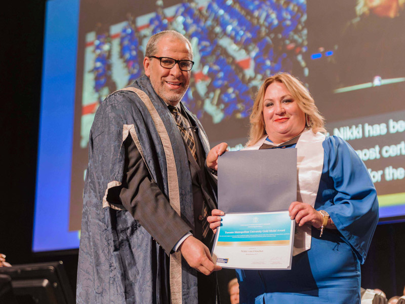 TMU President Mohamed Lachemi and Nikki van Oirschot.