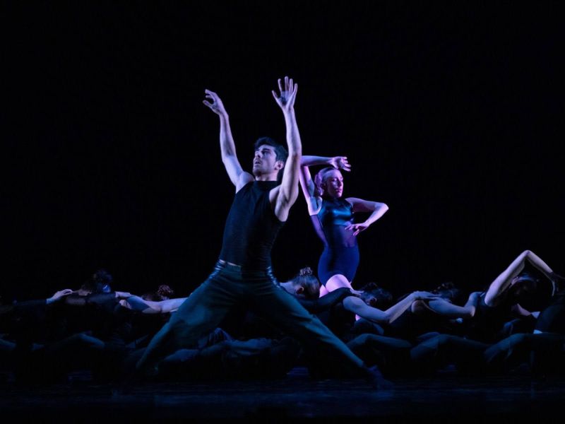 Dance students on a stage perform To the Ends of the Earth by Guillaume Côté.