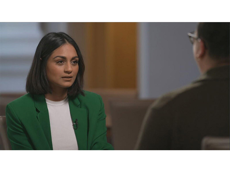 Shanelle Kaul conducting an interview.