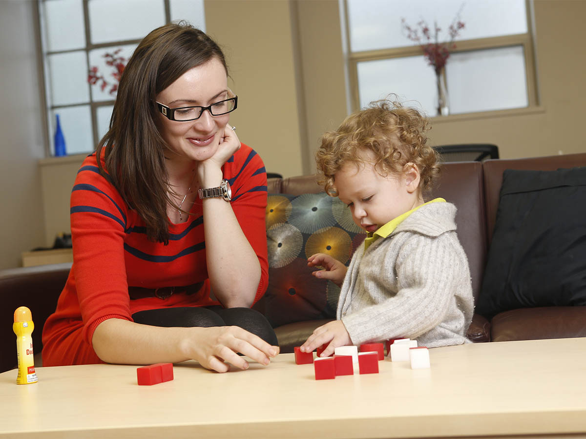 Graduate student with child participant