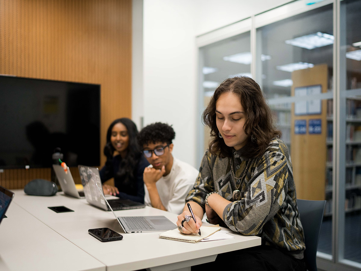 TMU students in a study room at the library
