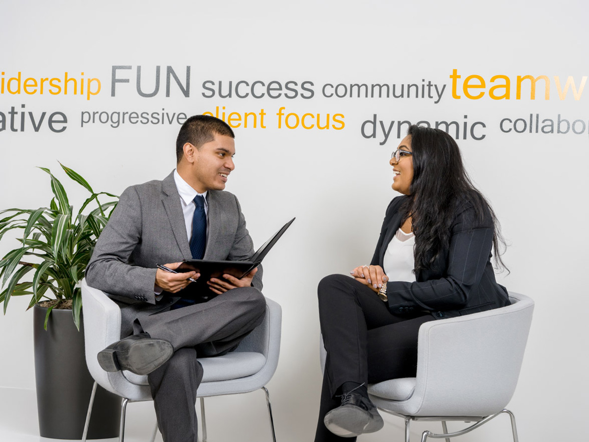 TMU students in business attire preparing for an interview