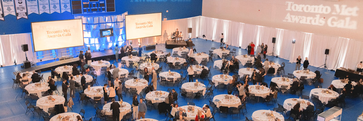 An aerial view of the tables and stage at the Toronto Met Awards Gala.