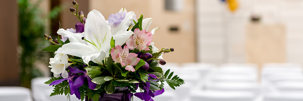 An arrangement of flowers on a table.