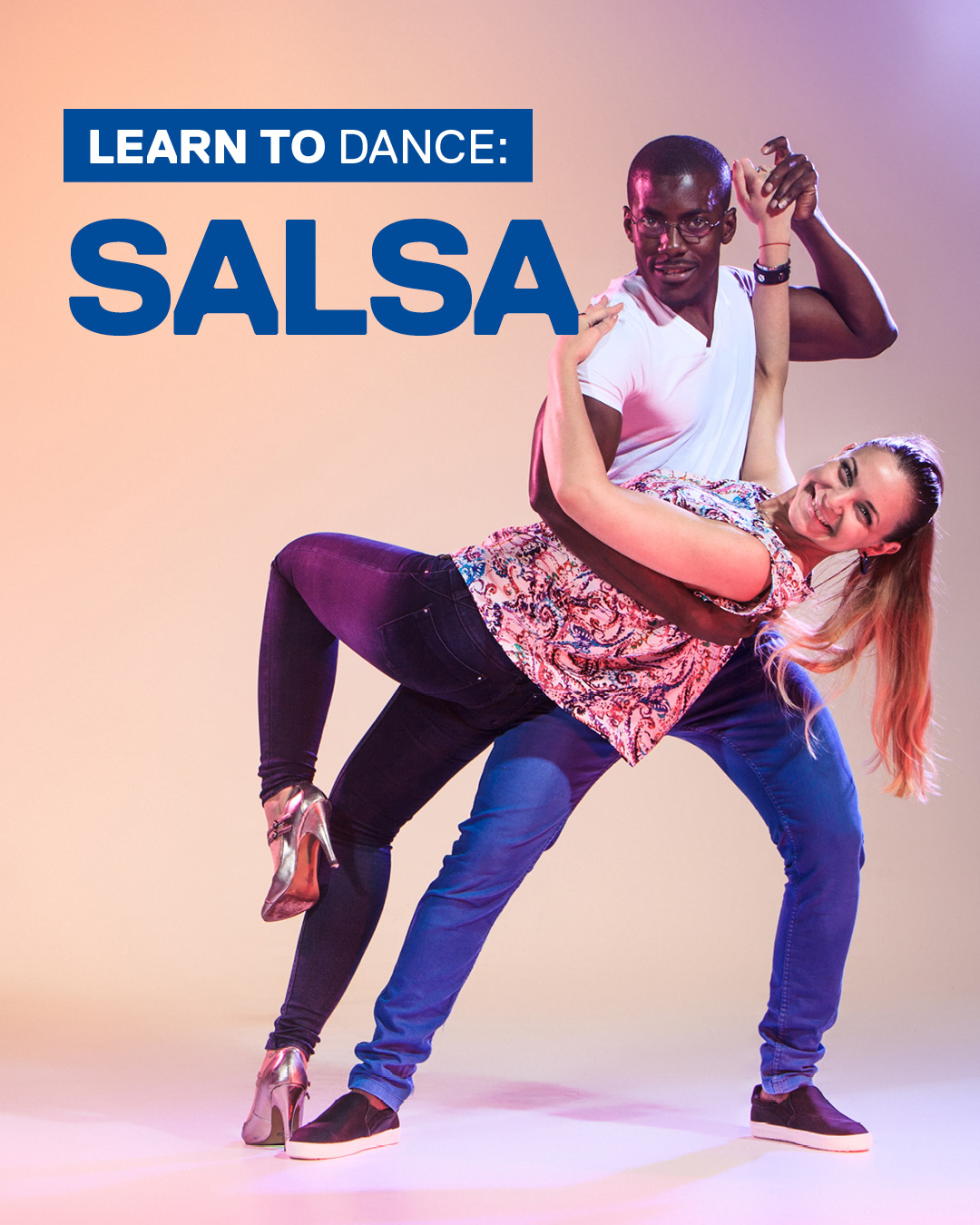 Two students dancing salsa