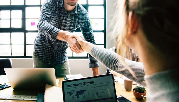 Two people shaking hands