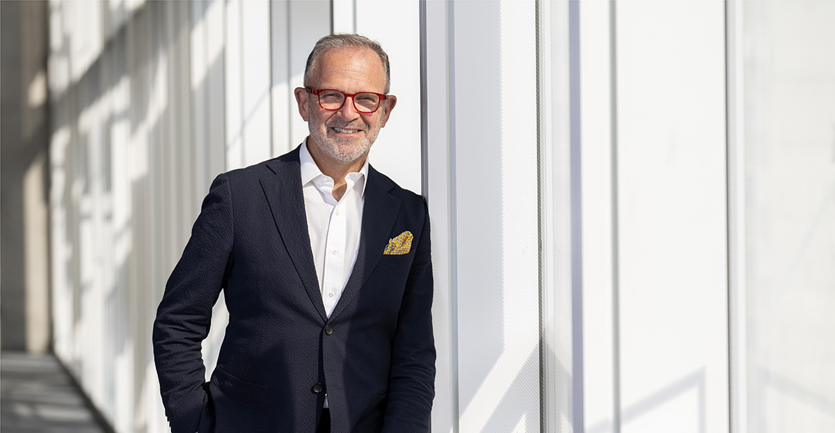 Steven S. Liss, Vice-President, Research and Innovation TMU in a bright hallway with windows