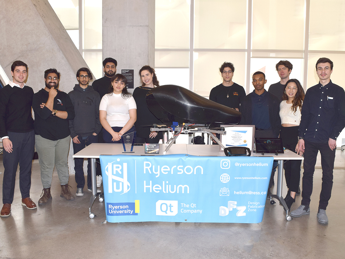 Ryerson Helium team members demonstrate their personal flying device at the DMZ Sandbox.