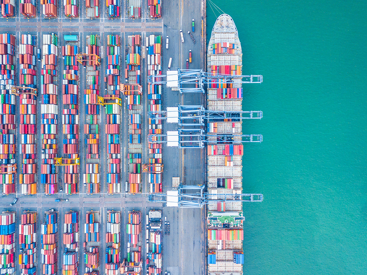 Aerial top view container cargo ship, Business import export logistic and transportation of International by containr cargo ship in the open sea.