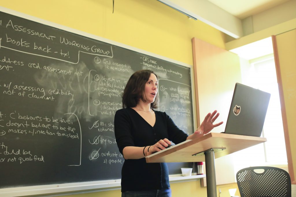 Prof. Hilary Evans Cameron presenting in a classroom