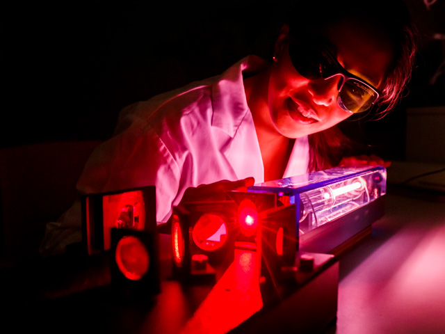Faculty of Science, Department of Physics student working with laser.