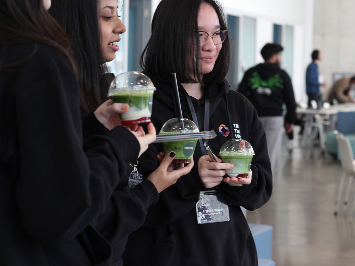 Students holding matchas at TMU Tech Week