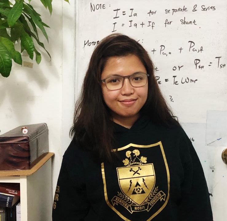 Luzalen standing in front of whiteboard