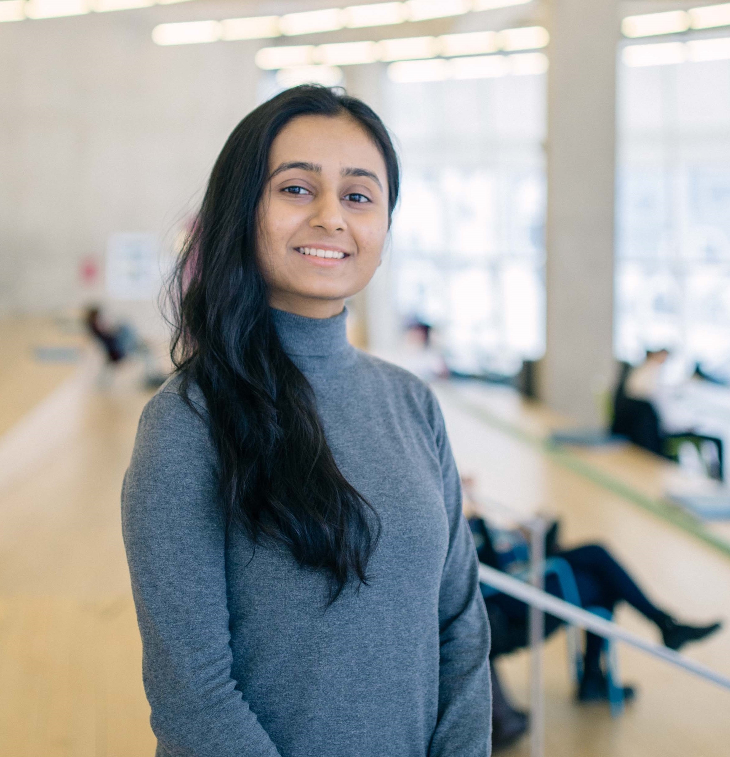 Sarick poses in the Student Learning Centre (SLC) for her headshot.