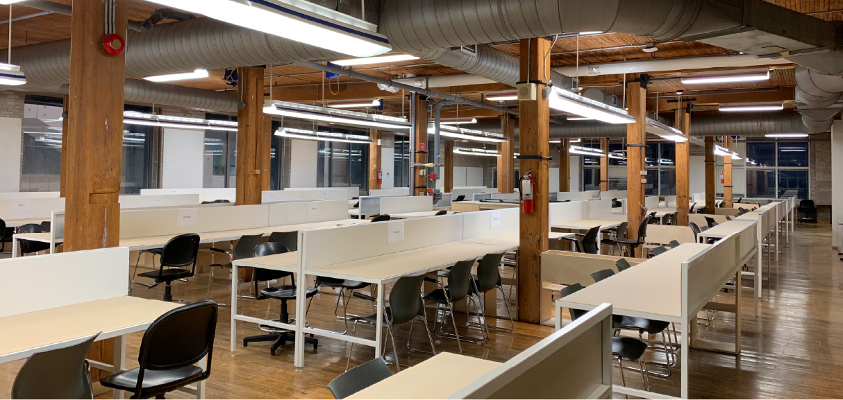 RSID Studio Space - White desks and wood ceiling