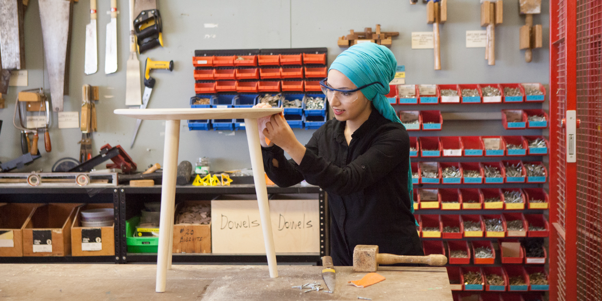 Student working on furniture production in RSID workshop