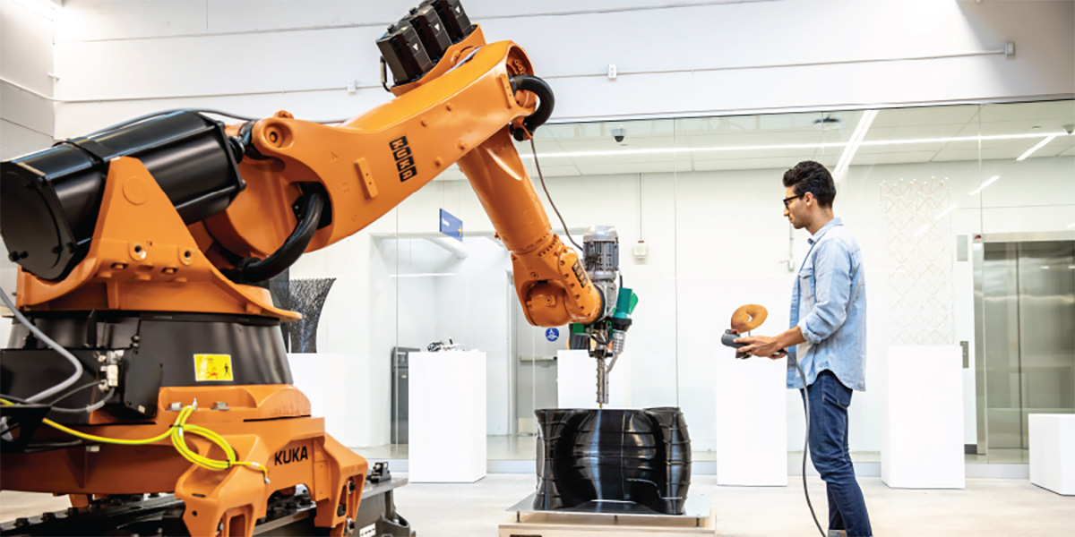 Student working with robot
