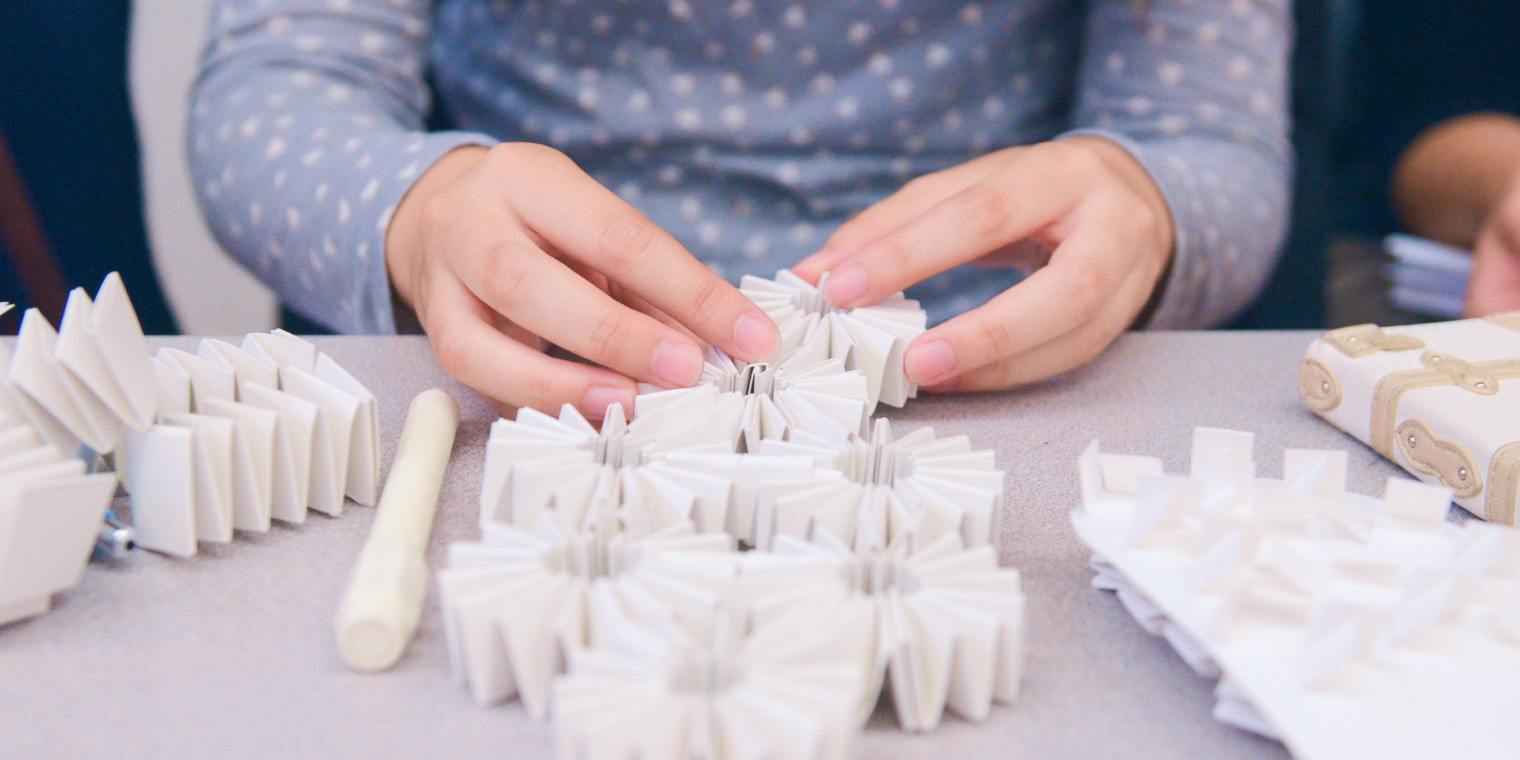 Interior Design student working with paper mock ups