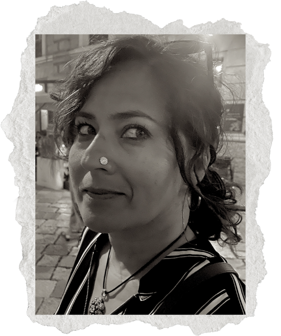 Photo of woman with nose ring looking to the side - Sonya Fatah