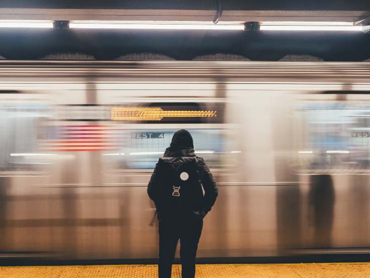A subway passed a student quickly in a blur.