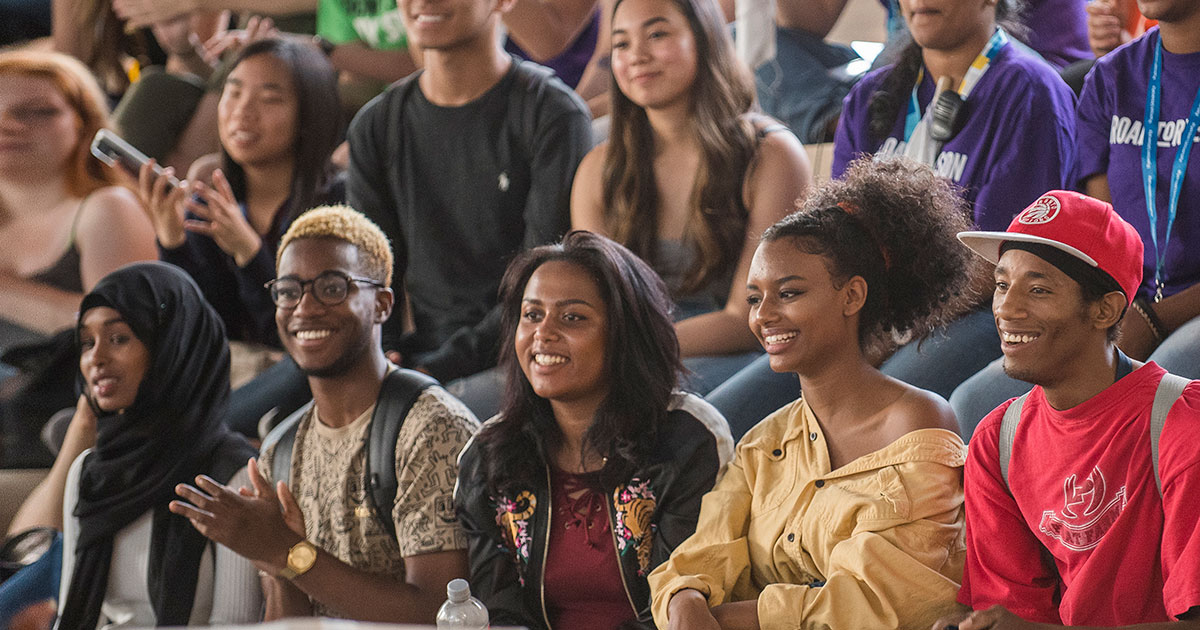 Black students engaged at an event on campus
