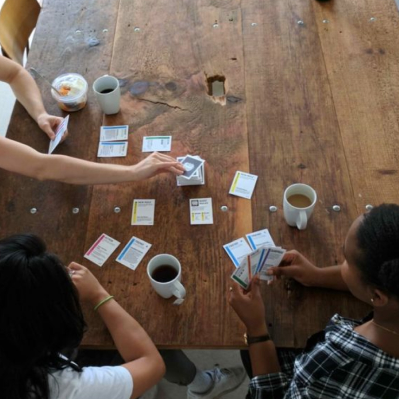 people playing a card game