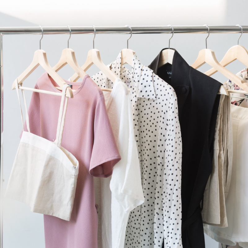 Clothes hanging on a clothing rack