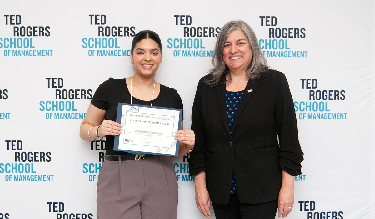 Dean Cynthia Holmes with award winner