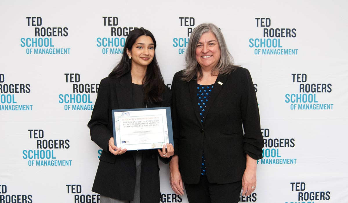 Dean Cynthia Holmes with award winner