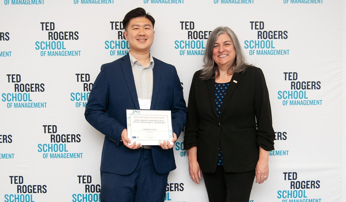 Dean Cynthia Holmes with award winner 