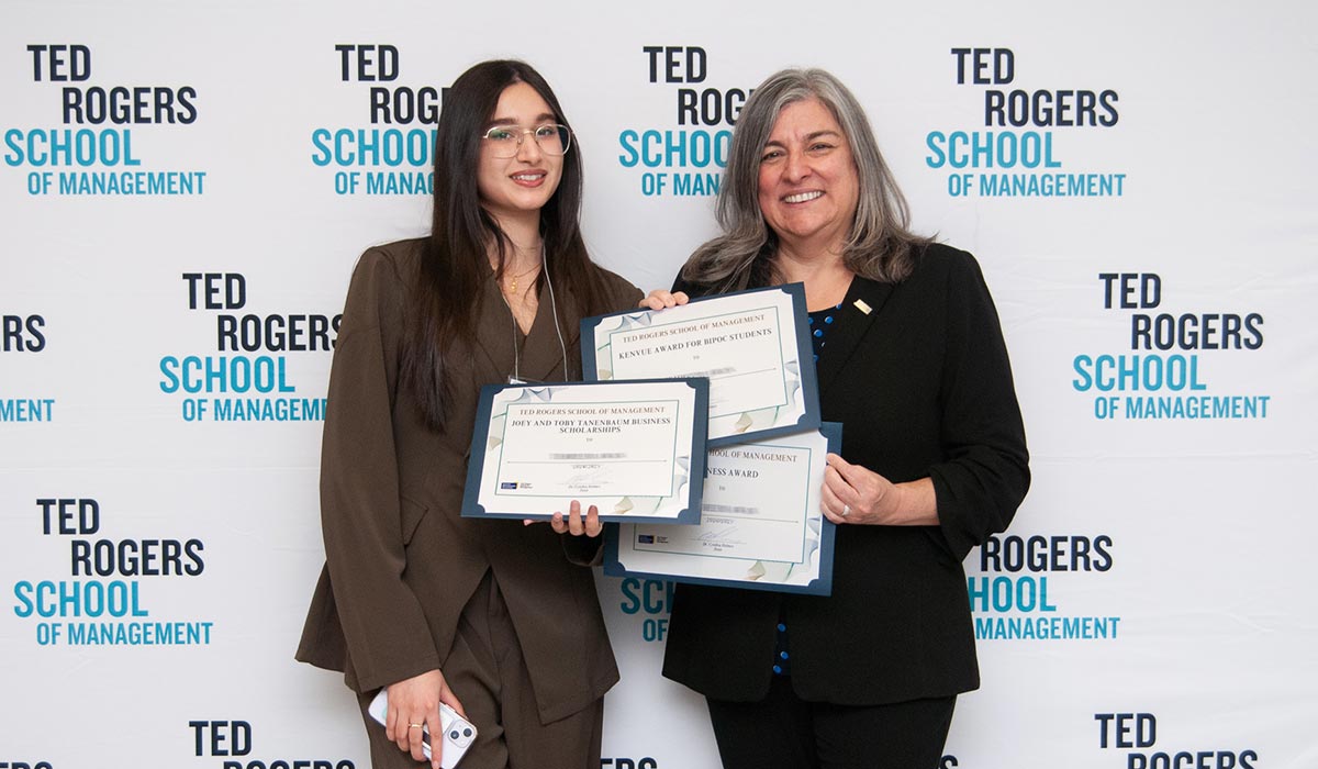 Dean Cynthia Holmes with award winner 