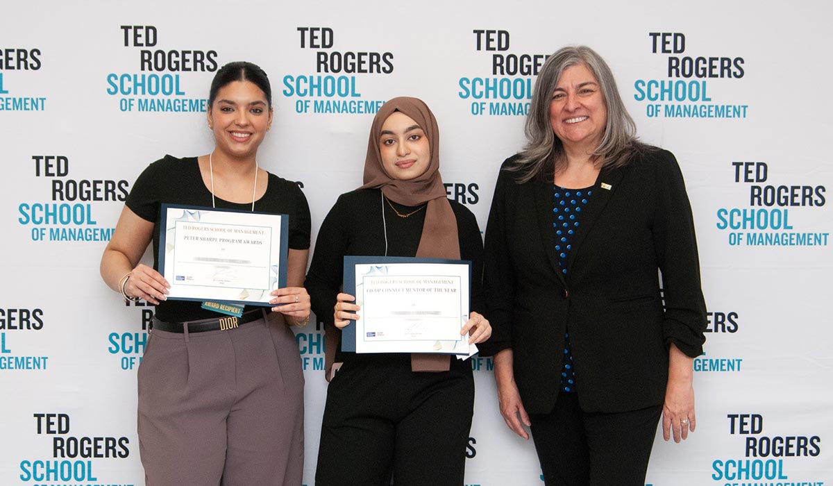 Dean Cynthia Holmes with award winners
