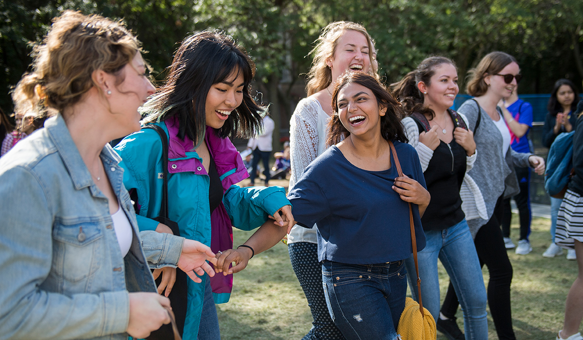 students hanging together in a group at campus