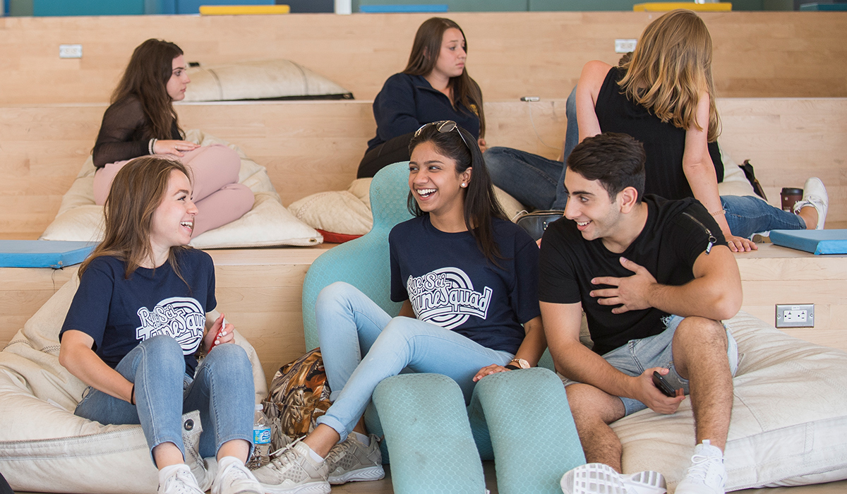students hanging together in a group at campus