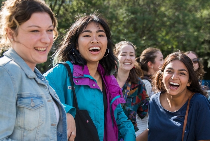 Students socializing on campus grounds