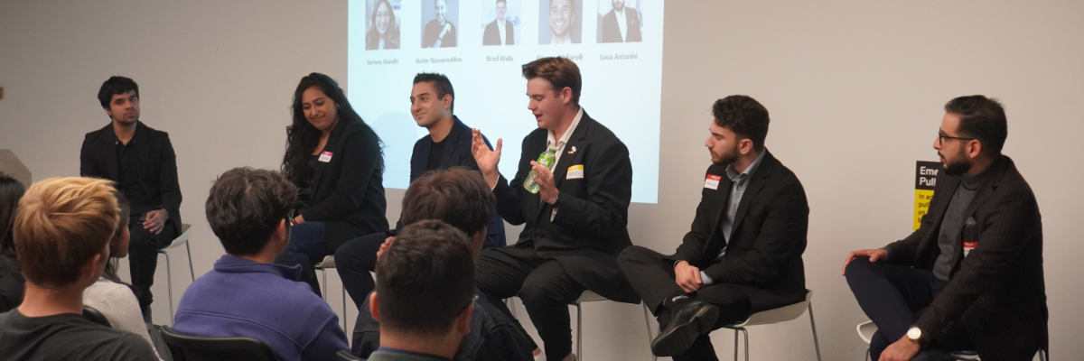 panel of industry leaders at an event