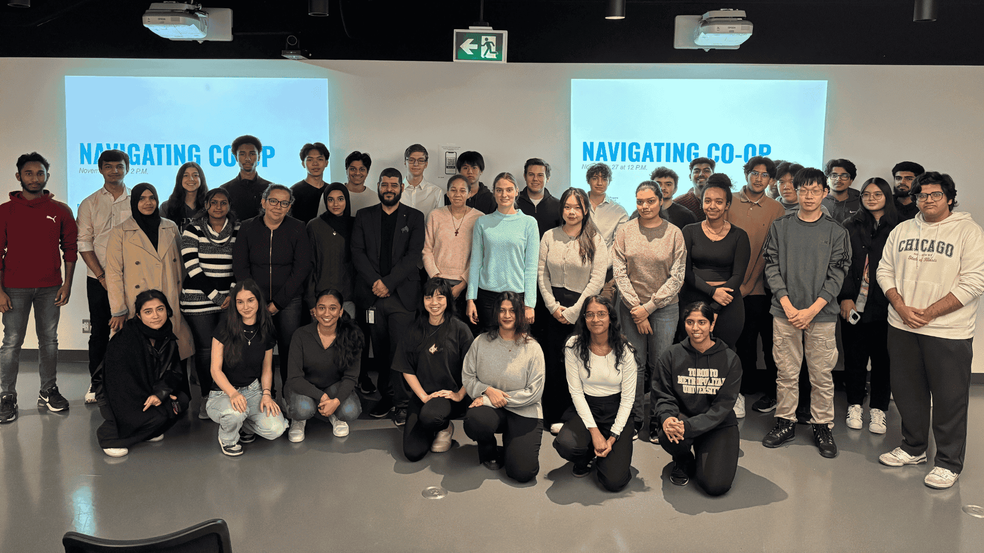 Large group of students smiling at camera